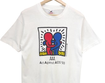 Vintage 1993 Keith Haring FOTL Keith Haring EE. UU. AAA acto contra la ayuda vintage Haring pop art gráfico blanco Haring de tamaño mediano hecho en EE. UU.