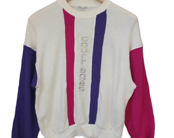 Sudadera vintage Courreges Paris con cuello redondo y bordado deportivo futurista en bloques de color. Talla mediana para mujer.
