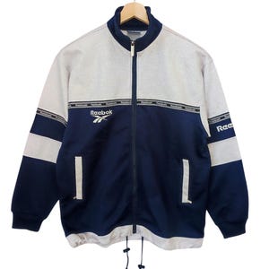Vintage 90s Reebok UK Sportswear Logo Reebok 2 tones Reebok Light Track Top Jacket Medium USA blue silver Reebok sports wear jacket out wear