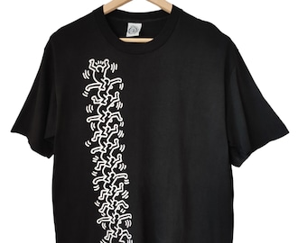 Camiseta vintage de Keith Haring con gente apilada a cuestas, tienda pop de los 80, EE. UU., arte pop de Keith Haring, grafiti, arte vintage de Nueva York, talla grande