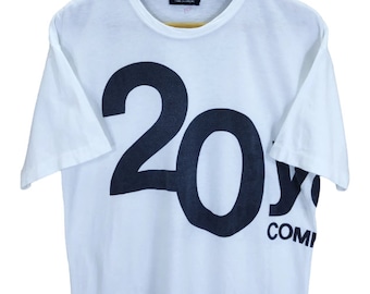 90s Vintage COMME des GARÇONS Celebración del 20 aniversario rei Kawakubo comme Des garcons deletrear medio cdg hecho en Japón