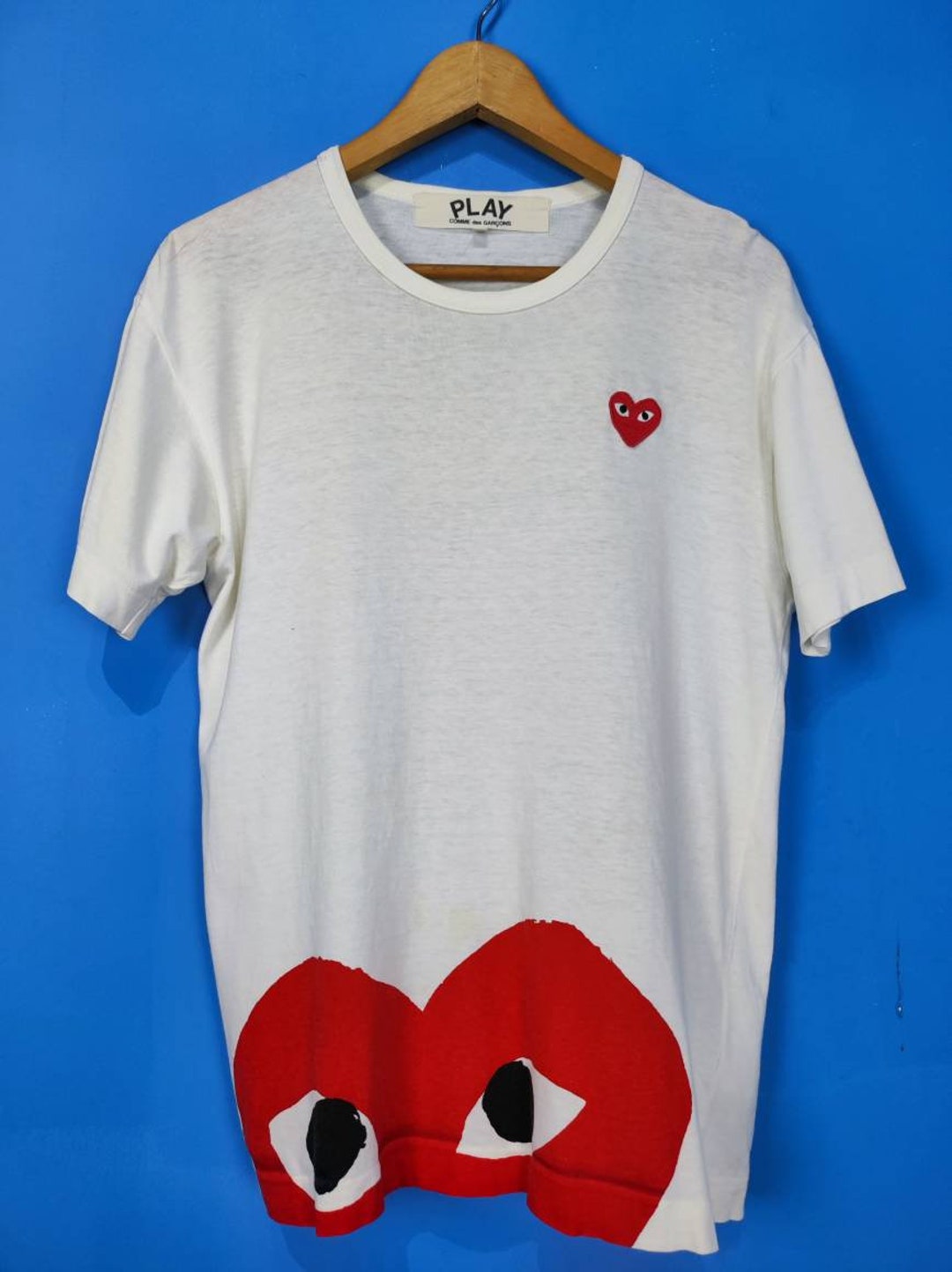 Comme des garçons traductor 2018 español deals