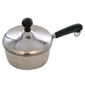 May include: A stainless steel saucepan with a lid and a black handle. The lid has a black knob. The handle has a metal loop at the end. The saucepan is on a white background.