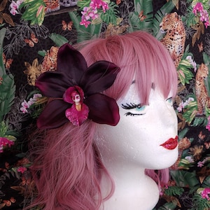 Deep Purple Orchid, with Glitter, and a Peek-a-BOO Skull Tiki Hair Flower clip