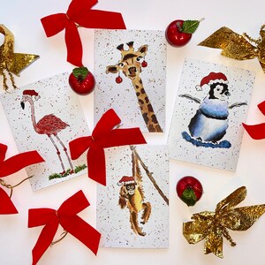 Confezione da 4 biglietti di Natale, animali divertenti, tema natalizio, pinguino, orango, giraffa, fenicottero, biglietti di Natale, dipinti originali di Wendy Doolin.