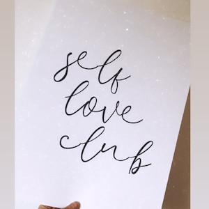 Impresión con cita inspiradora para decoración de pared con el lema Club del amor propio