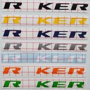 May include: Ten rows of vinyl stickers with the word "R KER" in different colors. The colors are red, black, yellow, blue, gray, light blue, orange, green, and pink.