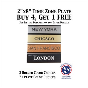 May include: A set of four 2" x 8" time zone plates with the cities New York, Chicago, San Francisco, and London. The plates are made of metal and have a brushed finish. The plates are stacked on top of each other. The image also includes a logo for TriStar Engraving, a veteran-owned and operated business. The text "BUY 4, GET 1 FREE" is displayed above the plates. The text "3 HOLDER COLOR CHOICES" and "21 PLATE COLOR CHOICES" is displayed below the plates.