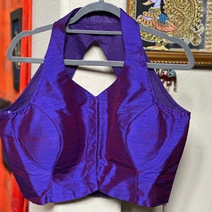 Silk halter blouse in purple. Size  38. Has margin upto 42 inches