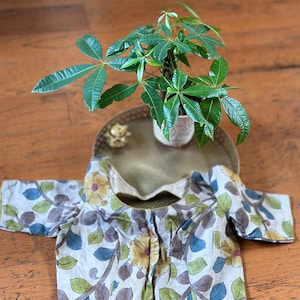 Grey with mauve vines kalamkari on pure tussar silk blouse. Size  38. Has margin upto 42 inches