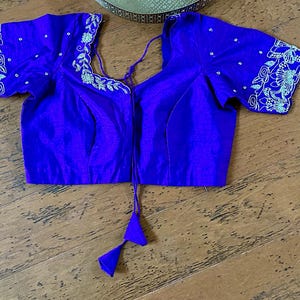 Purple work silk blouse! Size 38. Has margin upto 42 inches.
