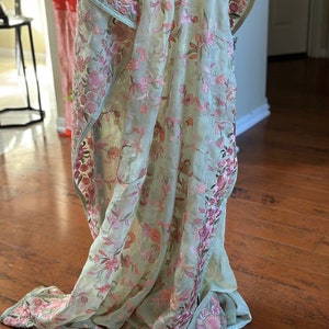 Mint green organza silk with Parsi gara work. Stitched blouse size 38(openable to 42)