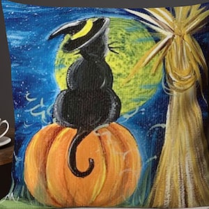 May include: A black cat wearing a witch's hat sits on top of an orange pumpkin. The cat is facing away from the viewer and looking up at a yellow moon in the night sky. A tall stalk of wheat is in the background.