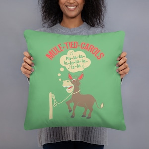 Christmas Singing Mule Throw Pillow. Green Background..Christmas caroling mule