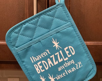 David Rose I haven’t bedazzled  anything teal blue oven mitt