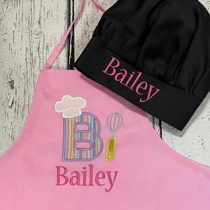 Personalized girls apron w pockets, optional hat, embroidered Initial in glitter fabric, gift for girl, 3 sizes fit most 3-12 yrs.