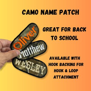 May include: Three camo fabric name patches with white and orange embroidered lettering. The patches read "Oliver", "Matthew", and "Wesley". The text "CAMO NAME PATCH", "GREAT FOR BACK TO SCHOOL", "AVAILABLE WITH HOOK BACKING FOR HOOK & LOOP ATTACHMENT" is also visible.