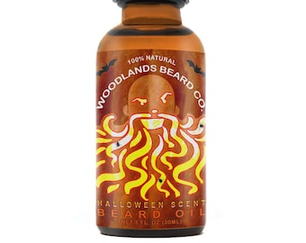 May include: A 1 fl oz (30 ml) bottle of beard oil with a label that says "100% Natural Woodlands Beard Co.". The label features a cartoon illustration of a man with a long, yellow beard and bats flying around him. The text "Halloween Scent Beard Oil" is printed on the label.