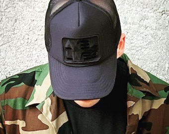 Axel vive un camionero negro triple