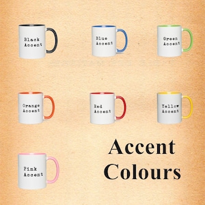 May include: A set of 8 white mugs with different colored accents. The mugs have the words "Black Accent", "Blue Accent", "Green Accent", "Orange Accent", "Red Accent", "Yellow Accent", and "Pink Accent" printed on them. The text "Accent Colours" is printed below the mugs.