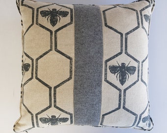 Honey Bee fabric cushion with grey wool centre. piped and zipped. plain grey back in hard wearing fabric.Hand made,  Upcycled and unique.
