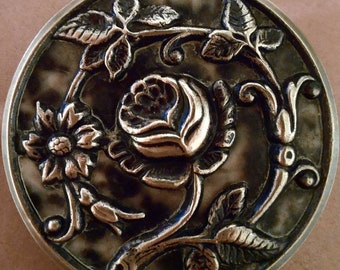 3.5cm. 1 repousse button,antique picture button,trailing rose design with black and white color backing