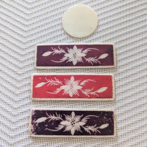 3 C1800-1900 mother-of-pearl carved thread winders/gaming counters. 6cm by 2cm wide.