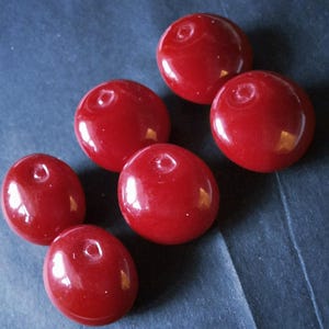 6 stunning buttons red apple italian  glass .  12mm dianeters or 1.2cm.