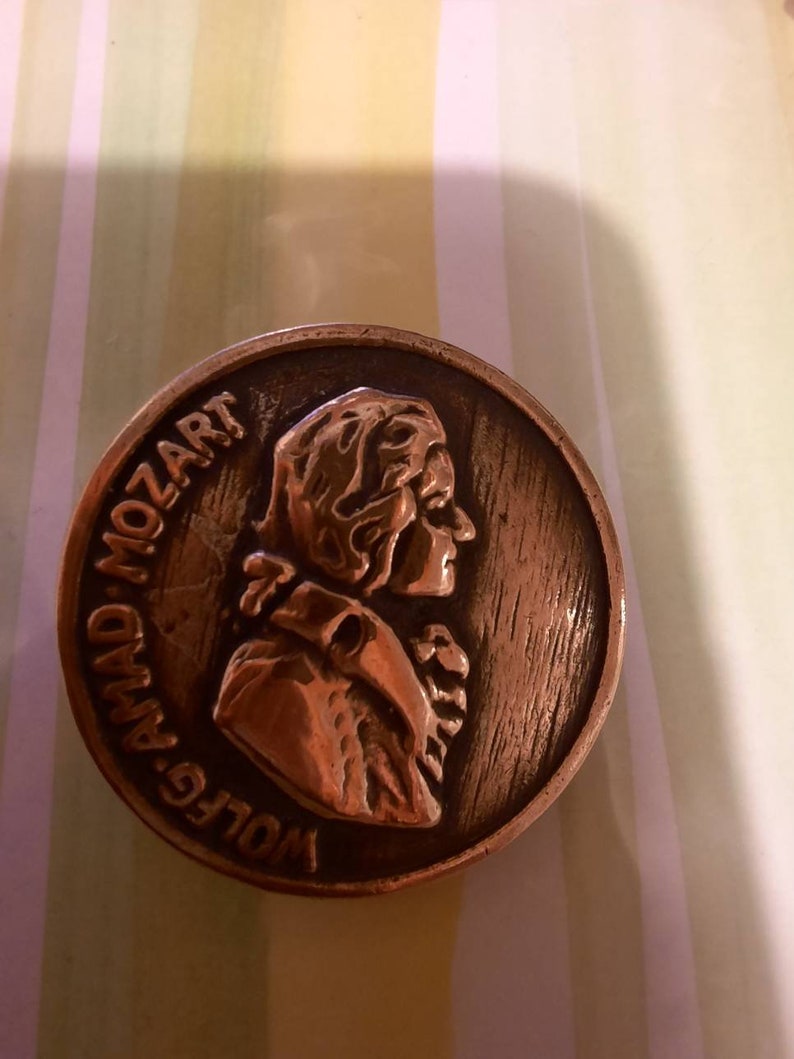 1 antique mozart music composer head button Copper fitted 1 inch diameter.