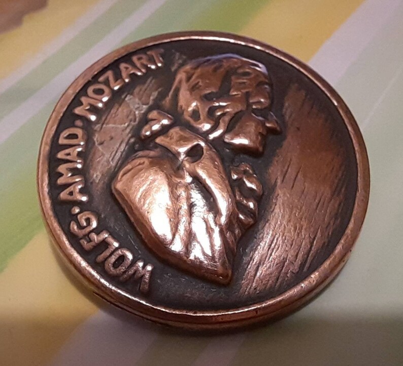 1 antique mozart music composer head button Copper fitted 1 inch diameter.