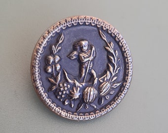 Bottone a forma di cherubino del 1800, motivo a ghirlanda di frutta (diametro 1,1 cm)
