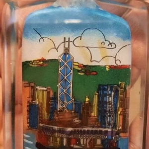 Vintage chinese scent/snuff bottle with inside glass flask and padded red glass and foam top. boxed gift. 9cm by 7.2cm.