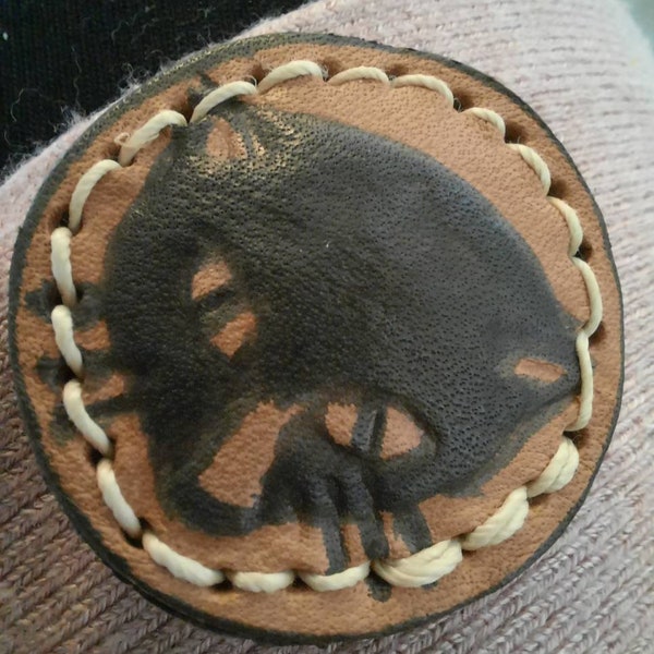 1 cat leather stitched border button 1.2 inch or 3.5cm diameter.