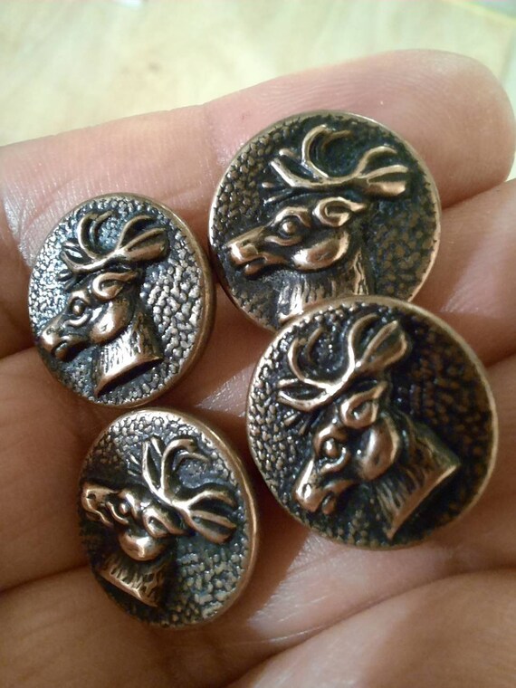 3.5cm. 1 repousse button,antique picture button,trailing rose design with black and white color backing