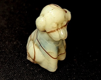 Tiny Glass dog antique collectible. 2.5cm long by 1.5cm widest.