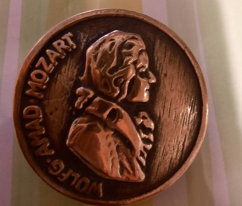 1 antique mozart music composer head button Copper fitted 1 inch diameter.