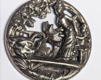 large Victorian Button. Shooing the Geese picture/story. 3.7cm diameter.