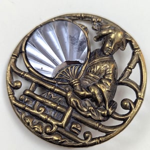 Button Antique Japanese geisha with a cut steel fan feature. Large 4 cm diameter.