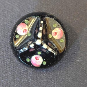 Antique handpainted black glass button. 1.8cm diameter.