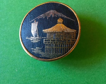 Vintage Damascene button of mountain boat and temple. signed. 1.8cm diameter.