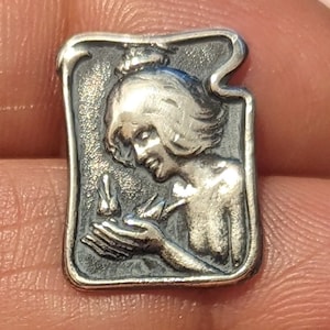 C 1902 art nouveau button of girl with bird in hand. 2.7cm long by 1.2cm wide. William Huttan . image 2