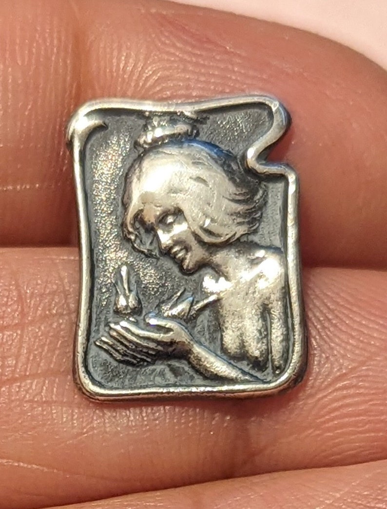C 1902 art nouveau button of girl with bird in hand. 2.7cm long by 1.2cm wide. William Huttan . image 2