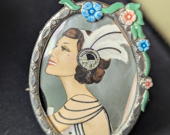 Art Deco foldable photo frame. Size 2 inches by 1 and a half.