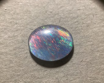 Opaal triplet cabochon 1st 10,7x8,8mm