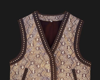 Snake embossed leather vest for bikers. 100% handcrafted vest. Hand braided. Colors available.