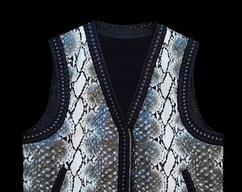 Python embossed leather vest for bikers. 100% handcrafted vest. Hand braided. Colors available.