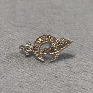 Antyczna broszka z lat 20. XX wieku z litego 14-karatowego białego złota w kształcie miecza masońskiego Shriner – 1,14 g – ostrze wysadzane diamentami – w idealnym stanie