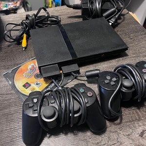 Console vintage Sony PS2 Slim nera - Due controller PlayStation 2/Memory Card/Due giochi gratuiti/Tutte le connessioni