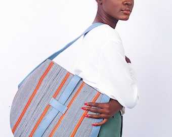 Akoa handcrafted African prints bag | Statement wax print bag  | Stylish work bag | Oval shaped handbag | Sturdy shoulder bag for women |
