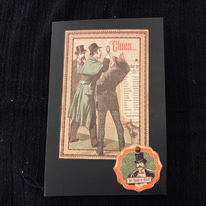 a fun album featuring Sherlock Holmes fun paper, Entire album in hand mademeasurements are approx 7 inches high, and 5 inches width.